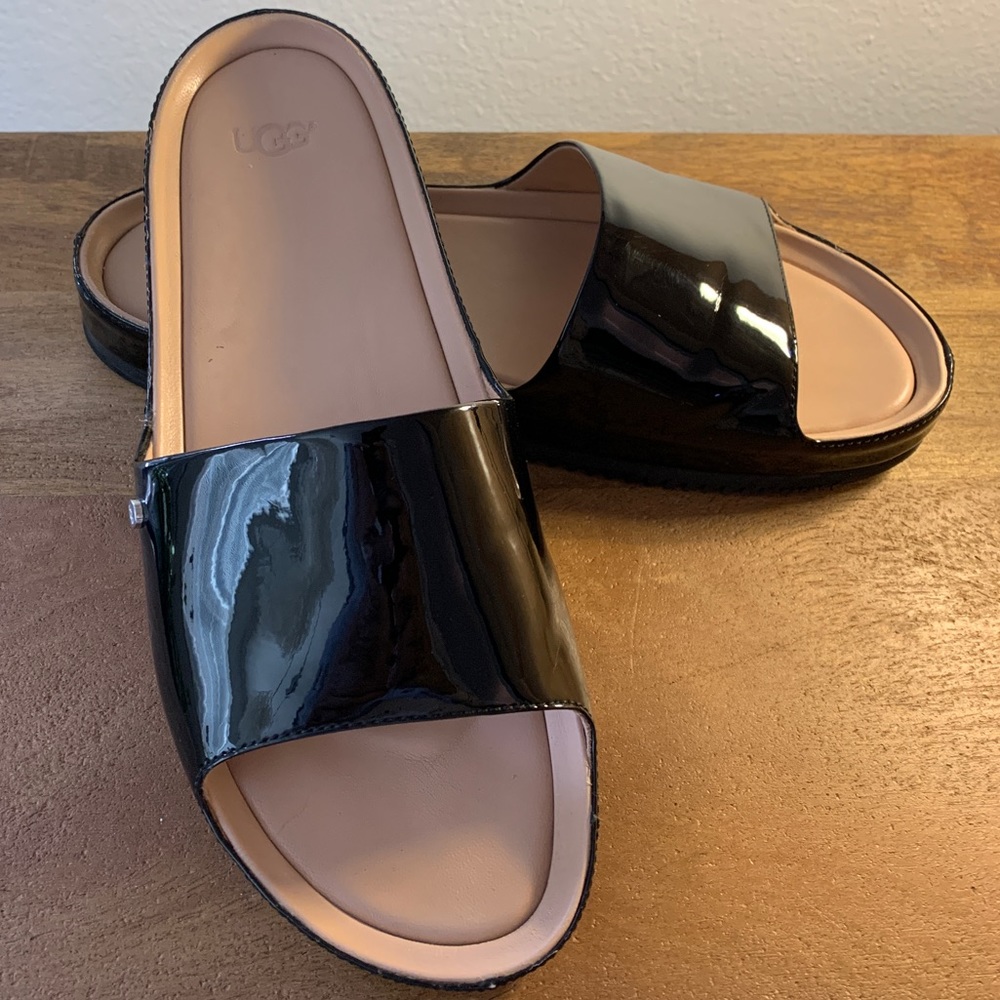 Slide sandal by UGG.